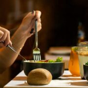 a woman eating a salad