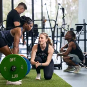 woman deadlifts at a BFT studio