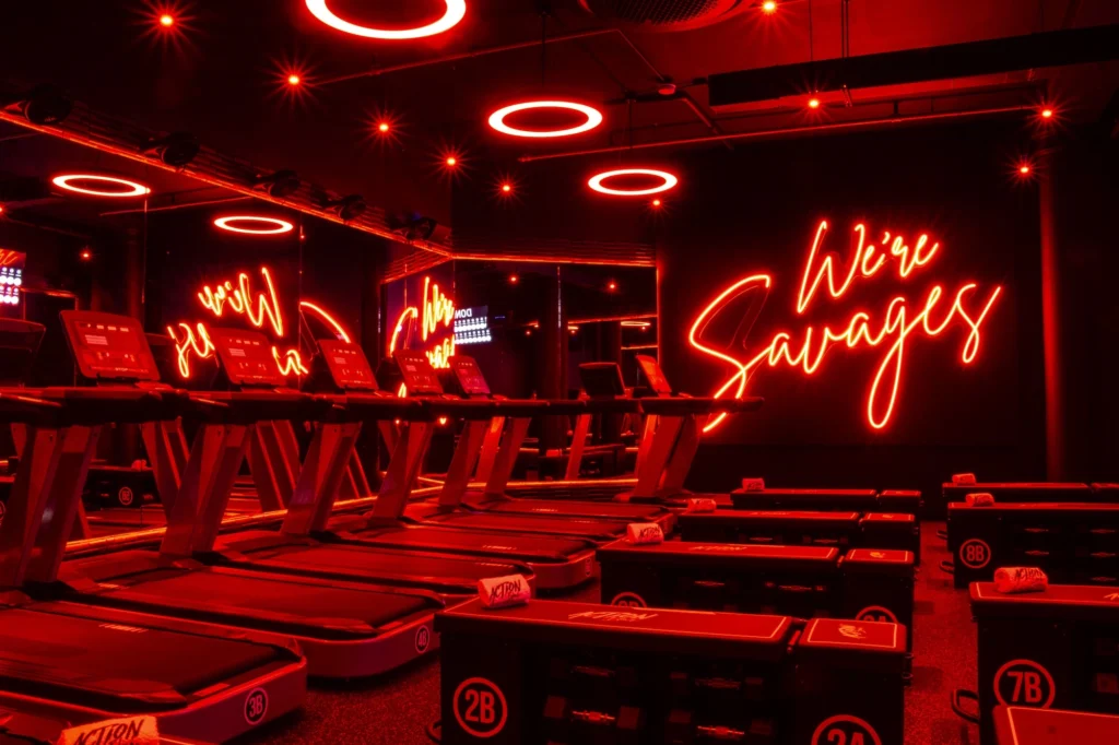 group fitness studio with treadmills and weight benches
