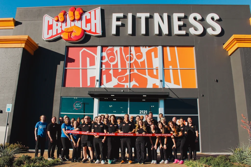 group photo outside Crunch Fitness