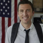 a smiling headshot of GoRuck founder Jason McCarthy