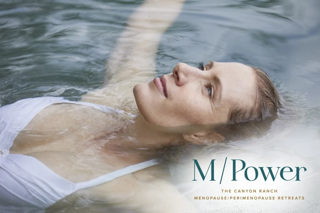 a woman immersed in water at Canyon Ranch M/Power wellness retreat.
