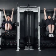 Two people working out on a Hyperion from REP Fitness