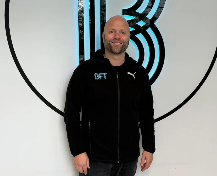 a smiling image of Tage Flugeim
