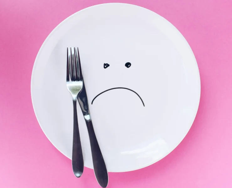 a dinner plate with a frown