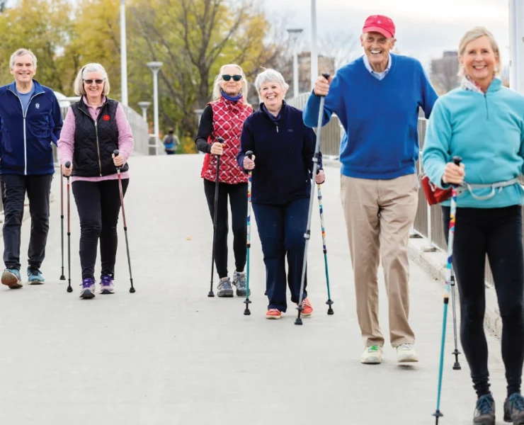 older people walking with poles